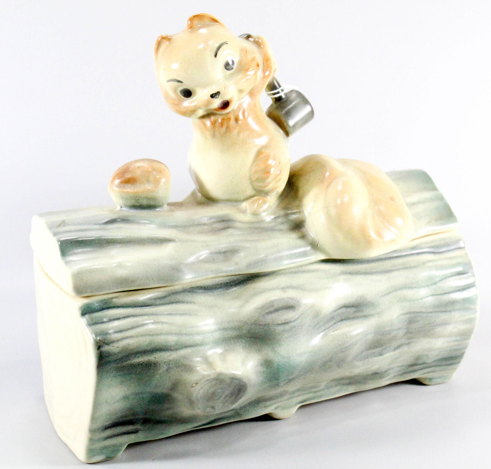 Chipmunk on a log cracking a nut cookie jar in the style of Brush McCoy (1 of 8)