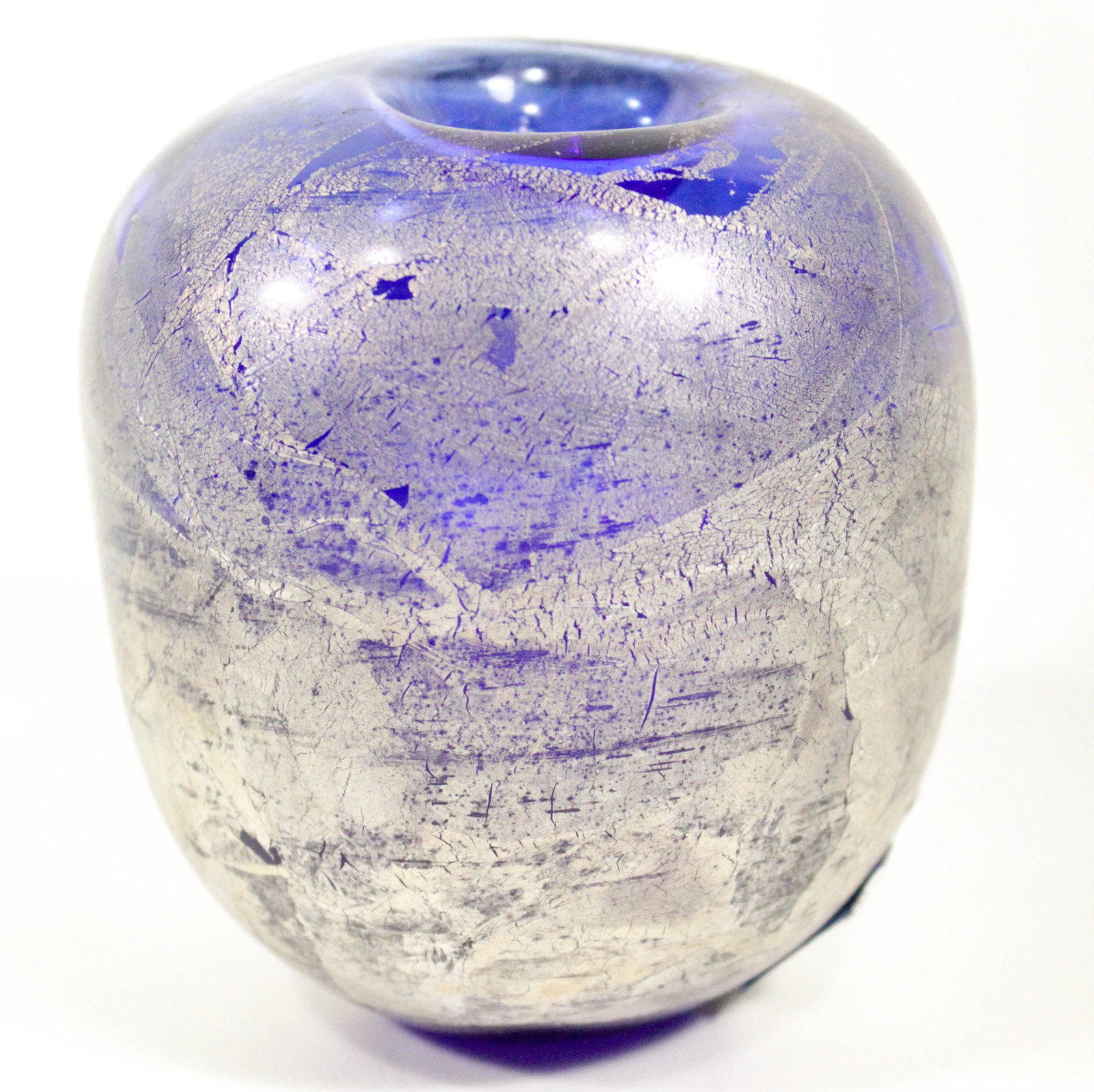 Blue globe vase in the style of Isle of Wight studio.: Blue globe vase in the style of Isle of Wight studio.