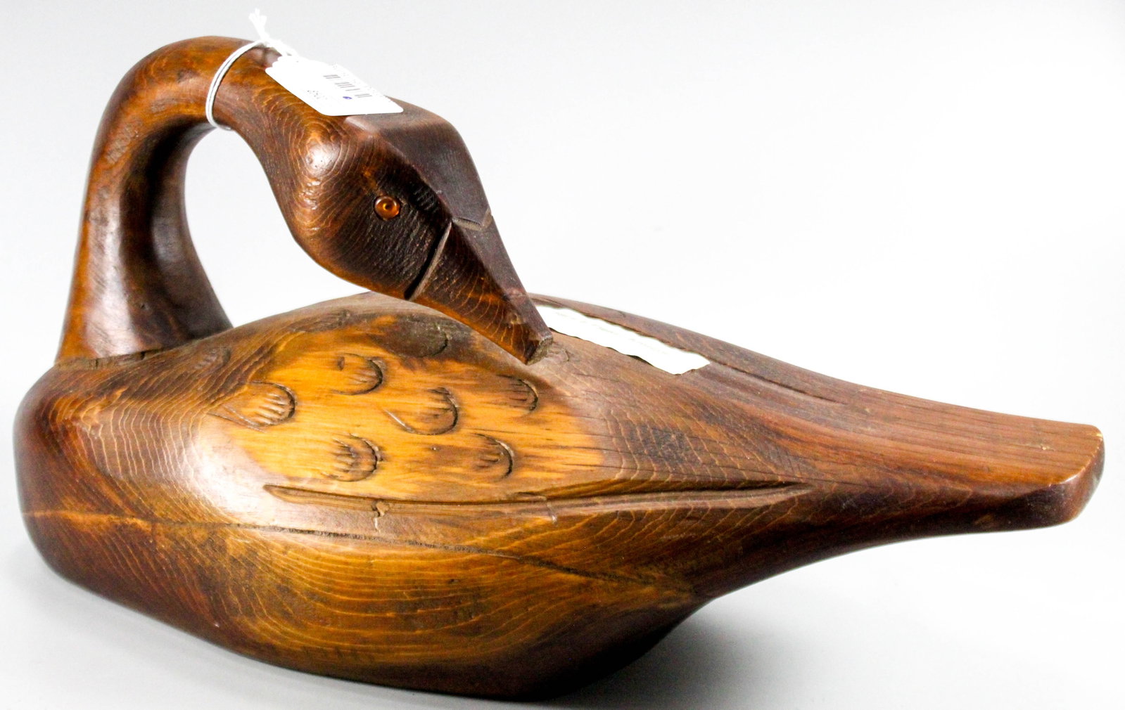 Wood duck Carved wooden goose decoy.: Carved wooden goose decoy. Marked "Made in Canada".