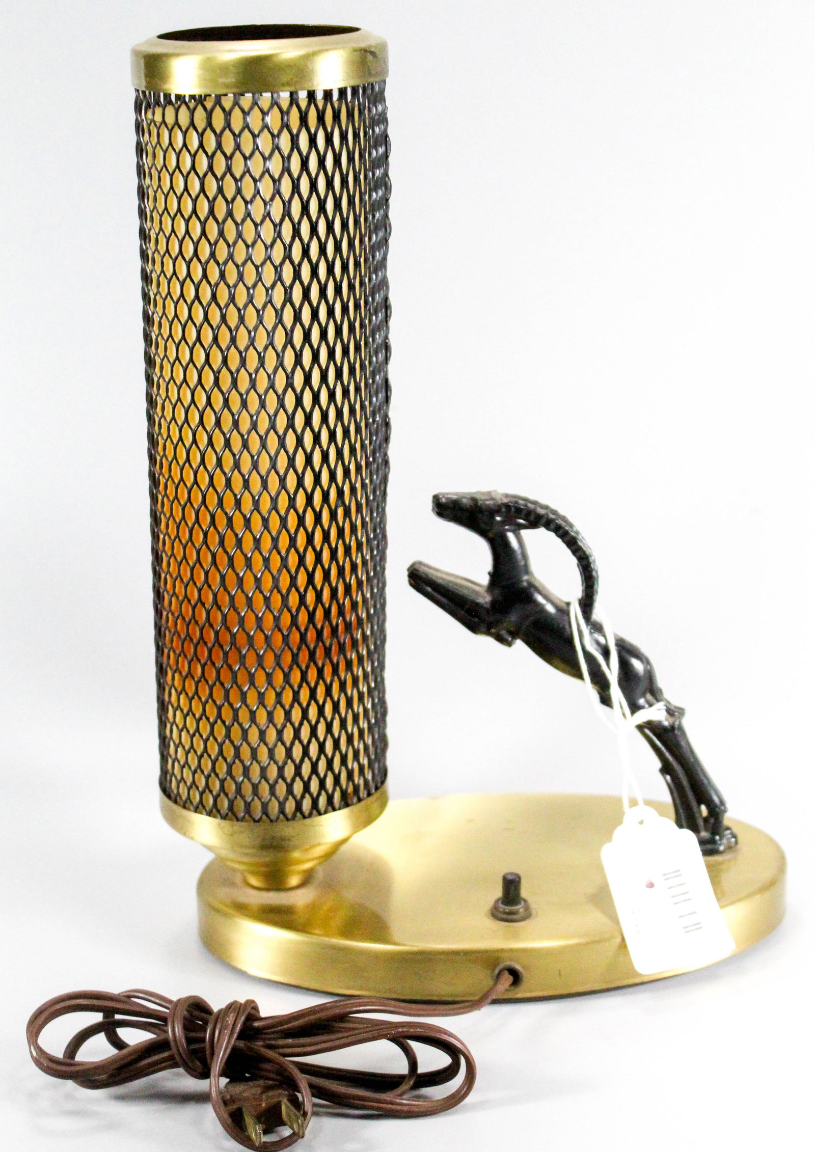 Art Deco table lamp with a leaping ram figure. (1 of 8)