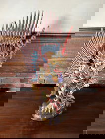 Garuda, Enemy of Serpents, 20th century painted wood Indonesian sculpture