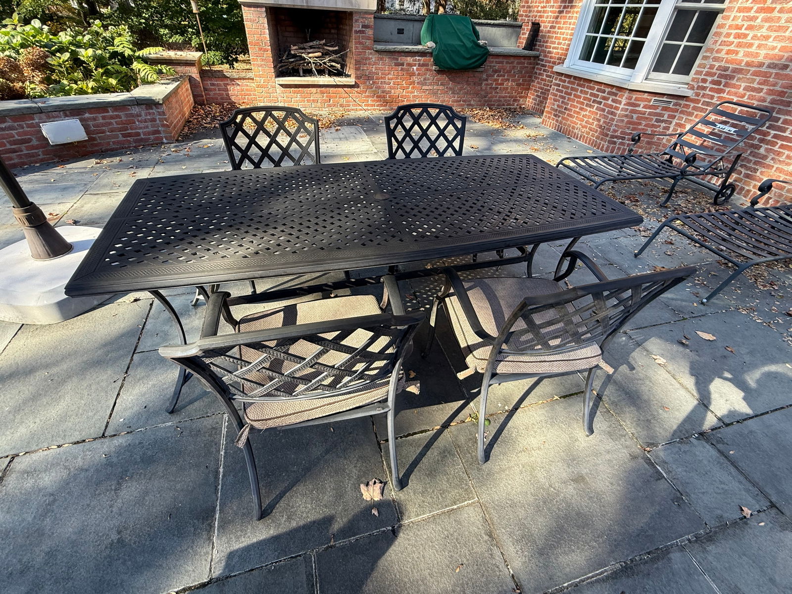 Black Metal Outdoor Table With Four Chairs: Lovely black metal patio table and chair set for any patio or deck.7 ft long x 3.5 ft wide and 29" height