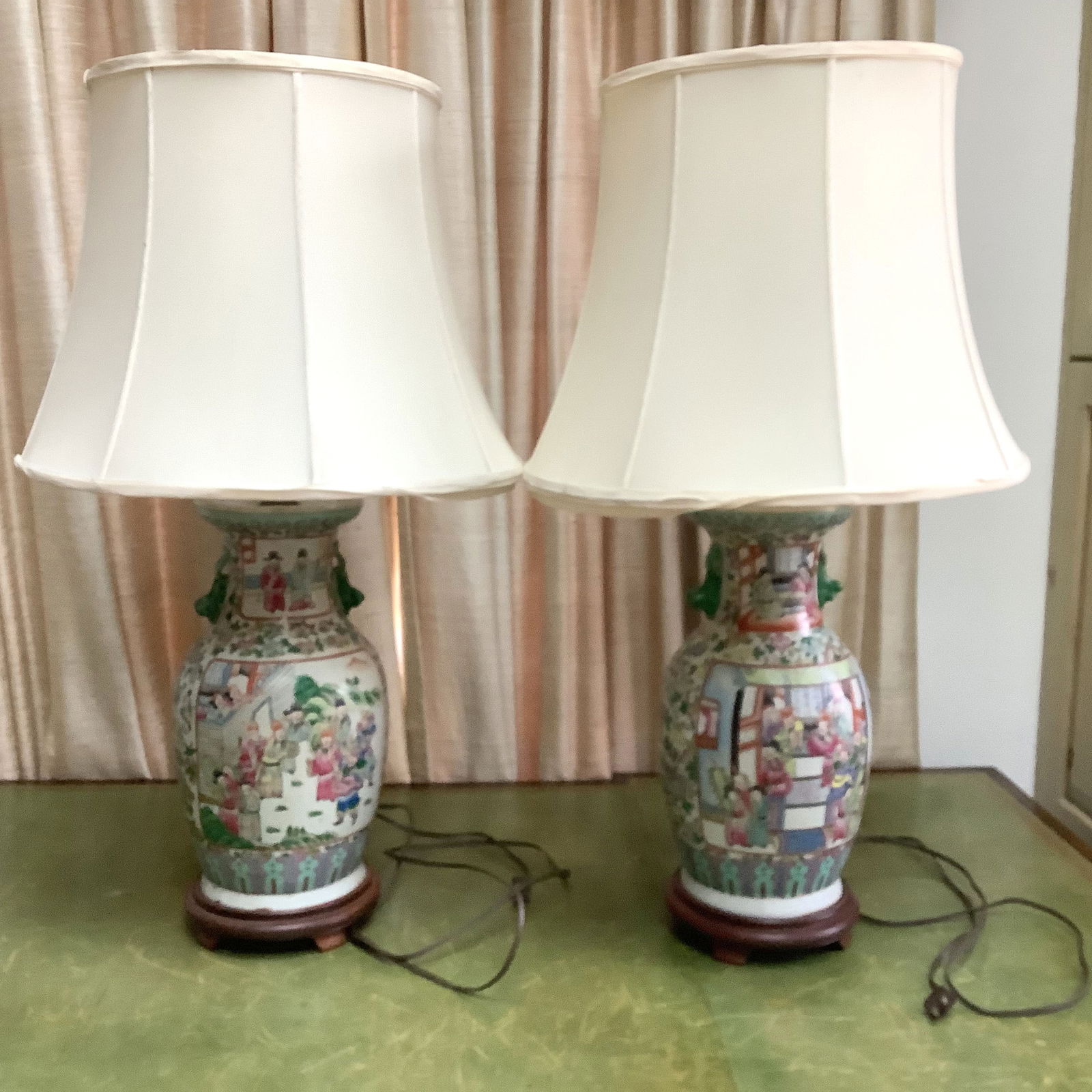 Pair of Chinese Famille Rose Porcelain Vase Lamps: These lamps are typically made from vases mounted on a wooden Base. The porcelain features an intricate hand-painted design.32in