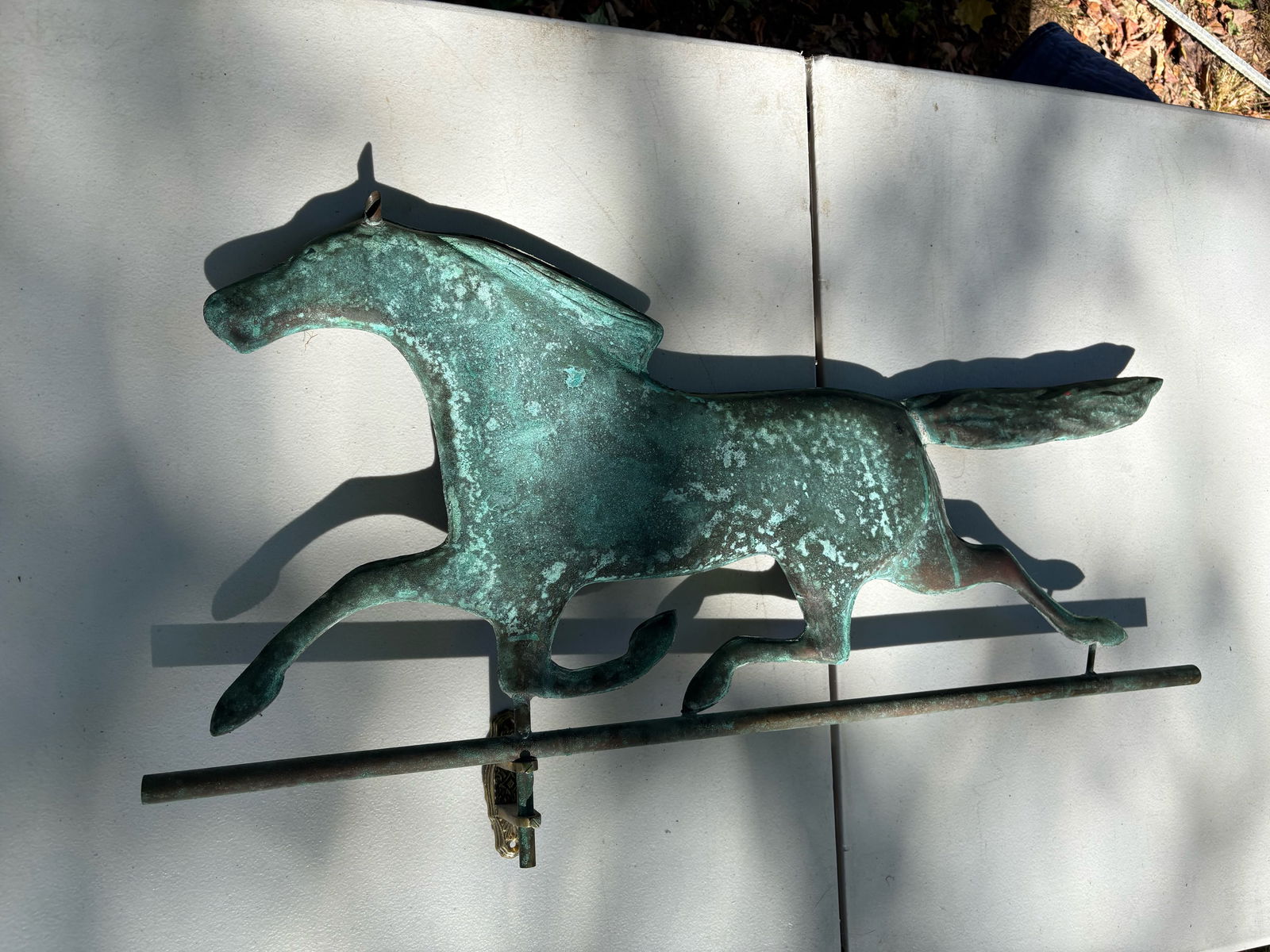 Antique copper weathervane horse c1900’s New England: Antique copper trotting horse weathervane, c 1900’s. Weathervane is 30” long, 14” high and 2” thick.the rod is 30.5” inches. Good condition with a beautiful patina from age.