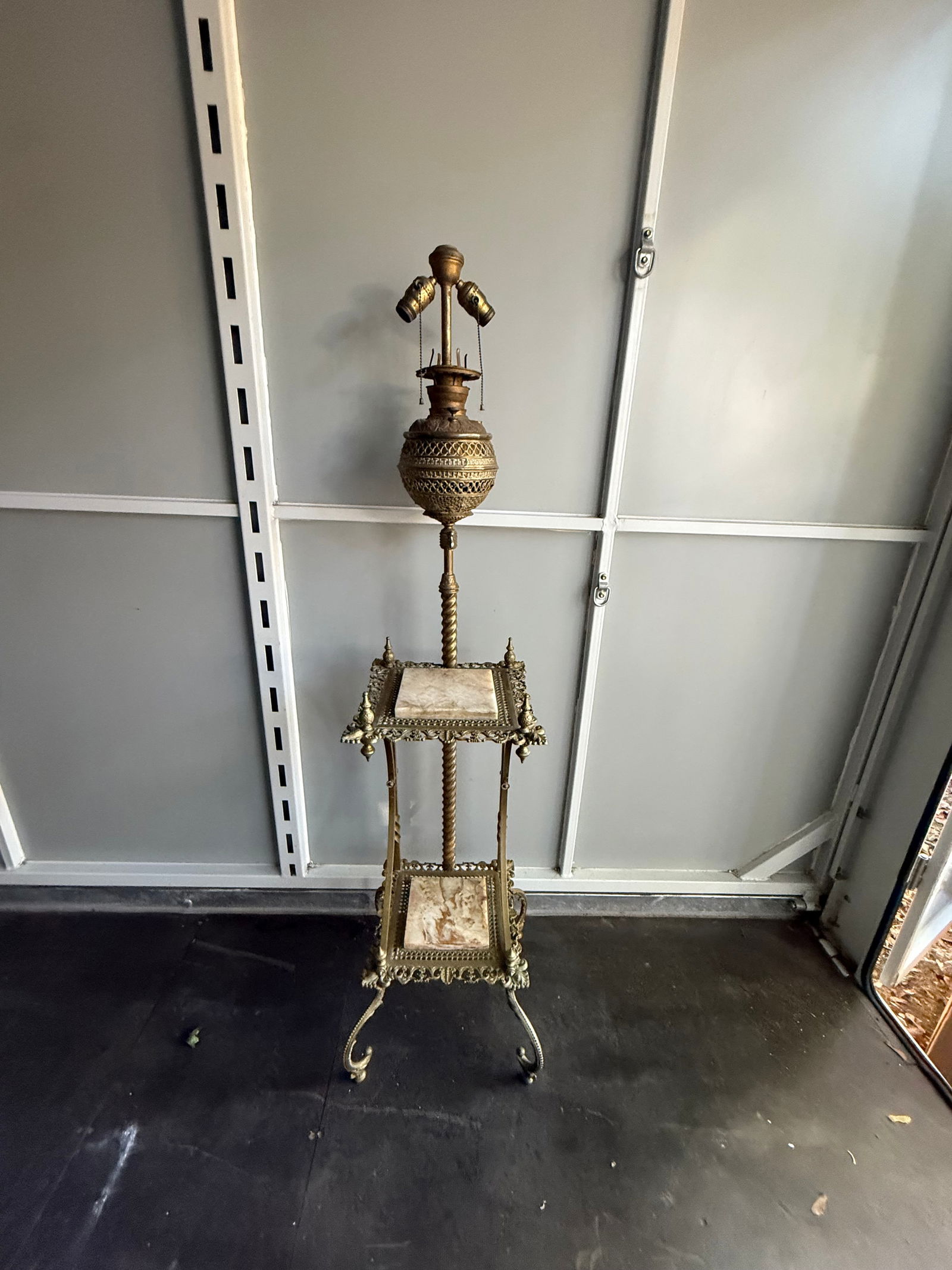 Antique Piano Lamp: This is an antique piano floor oil lamp with a marble table top.