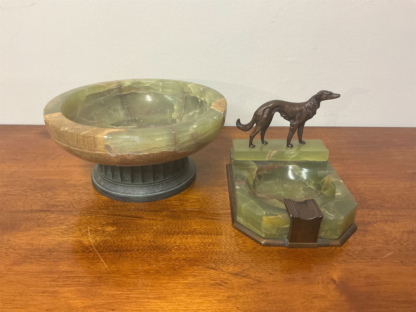 Antique Onyx & Brass Bowl and Ashtray with Borzoi: This exquisite set features an antique onyx bowl and a brass ashtray, each showcasing unique craftsmanship and elegance. The bowl, made from rich green onyx, is complemented by a stunning base,