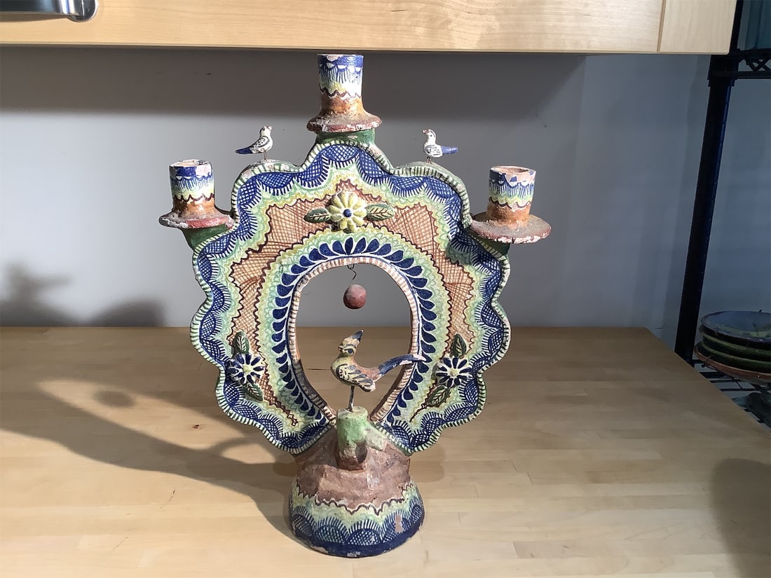 Vintage Mexican Tree of Life: Exquisite Vintage Mexican Tree of Life features intricate hand-painted details and vibrant colors. The piece showcases a beautifully designed motif, complete with four candle holders, surrounded by