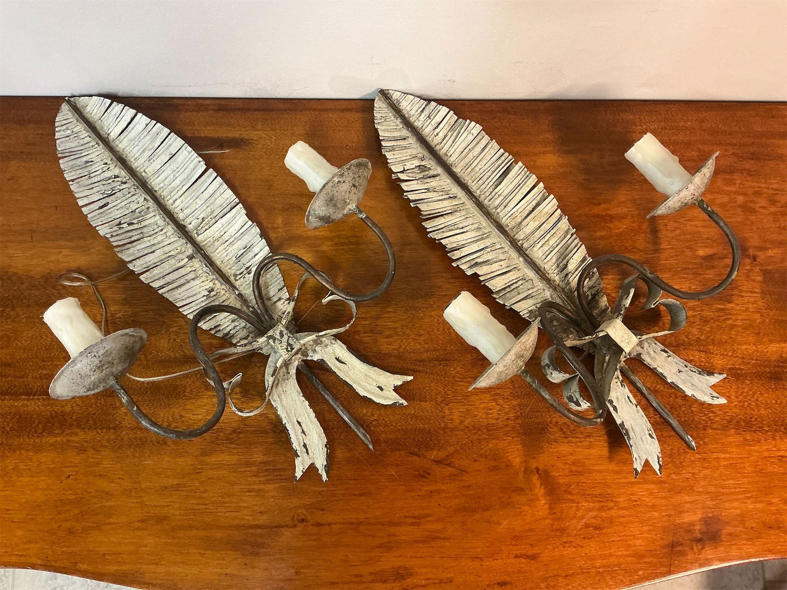 French Antique Feather & Bowl Sconce Lighted: Stunning pair of French antique wall sconces, designed in the elegant style of feather and bowl motifs. Each sconce boasts an exquisite leaf design, intricately detailed with textured ridges that