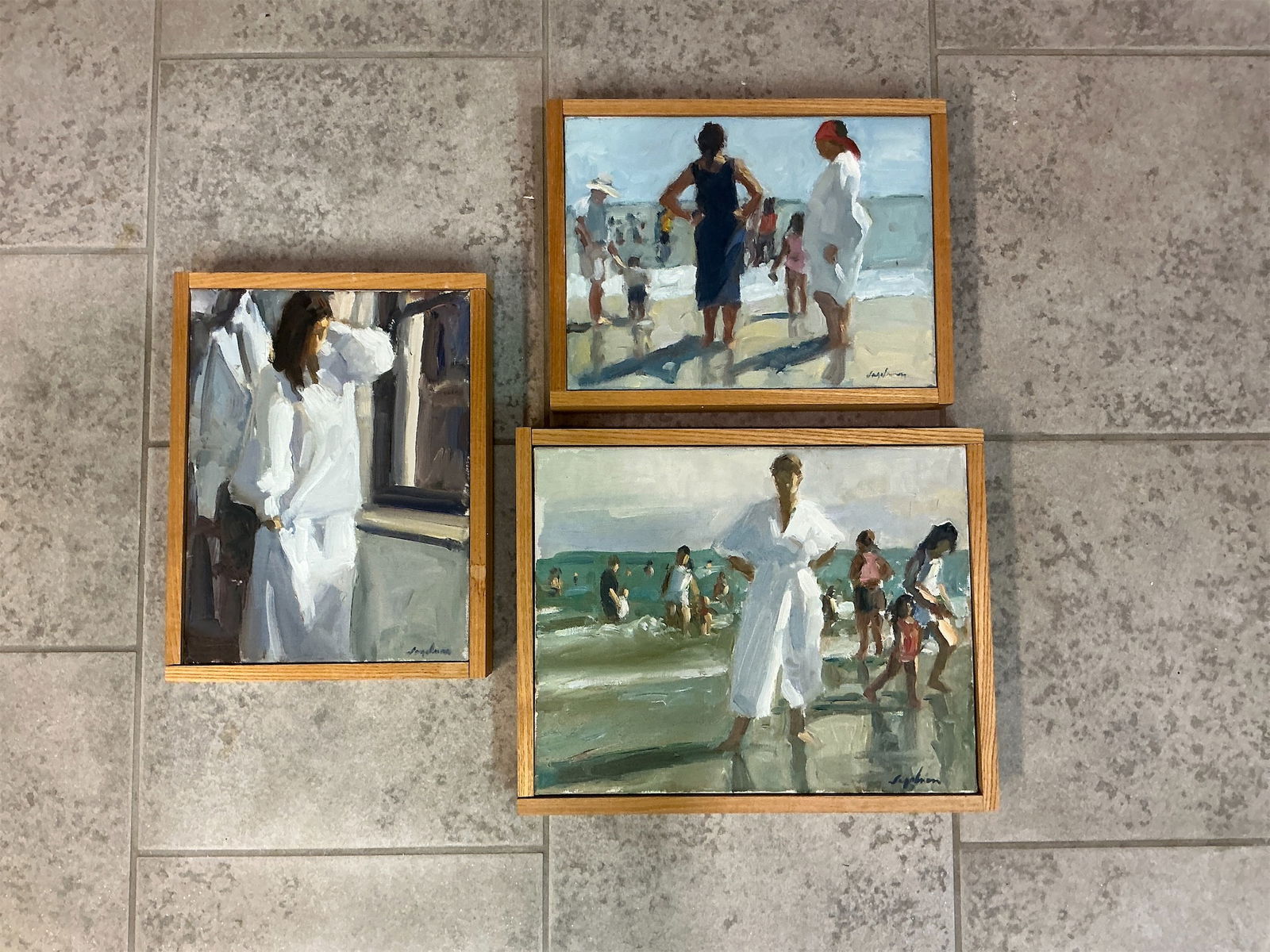 Set of 3 framed oil on canvas by Richard Segalman: This exquisite set features three framed oil on canvas works by renowned artist Richard Segalman. Each piece showcases Segalman s unique style, capturing moments that evoke a sense of nostalgia and