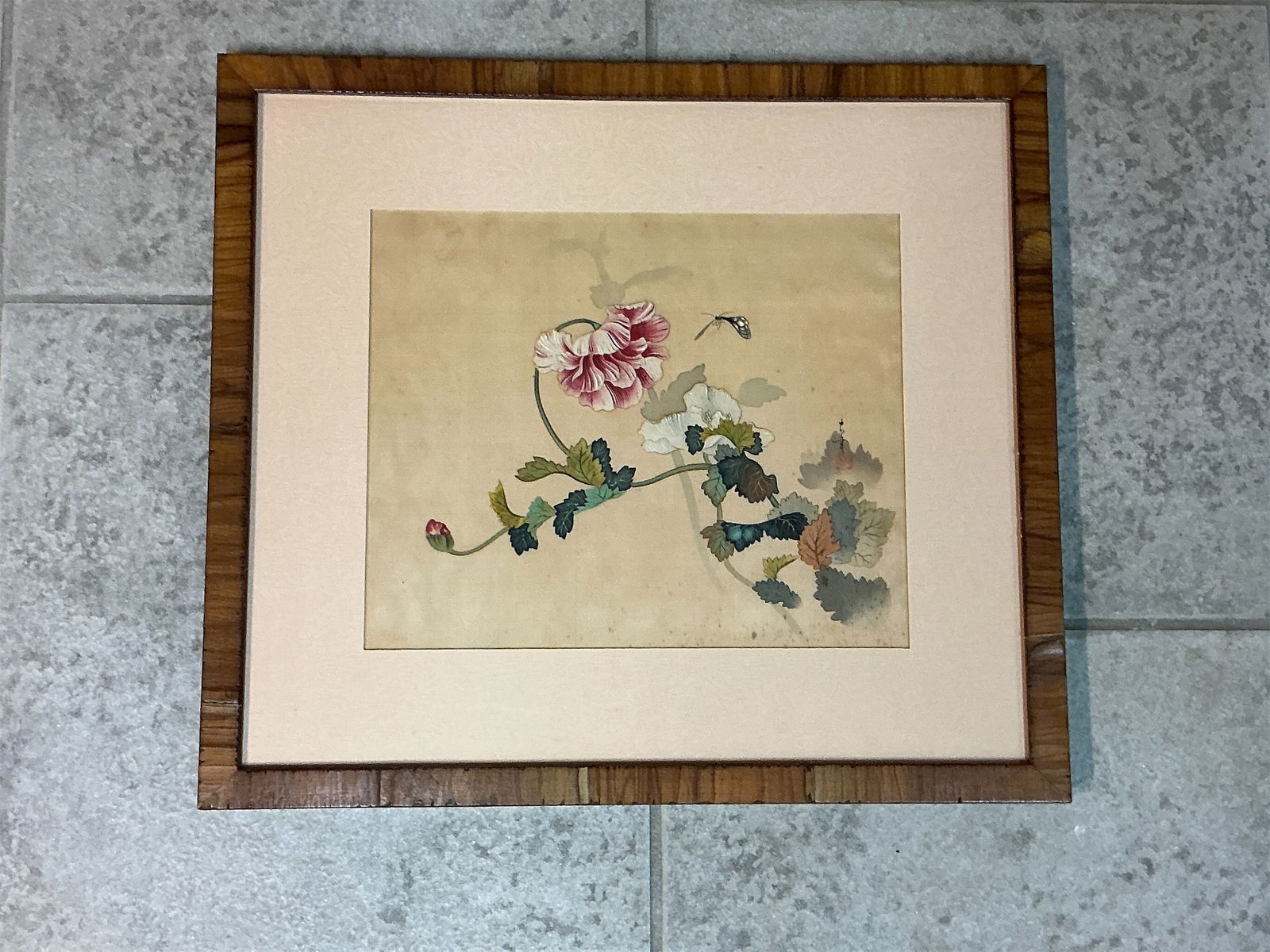 Antique Asian watercolor on silk: Discover a captivating antique Asian watercolor artwork beautifully rendered on silk. This piece features delicate floral elements, showcasing intricate detailing in shades of pink, white, and lush