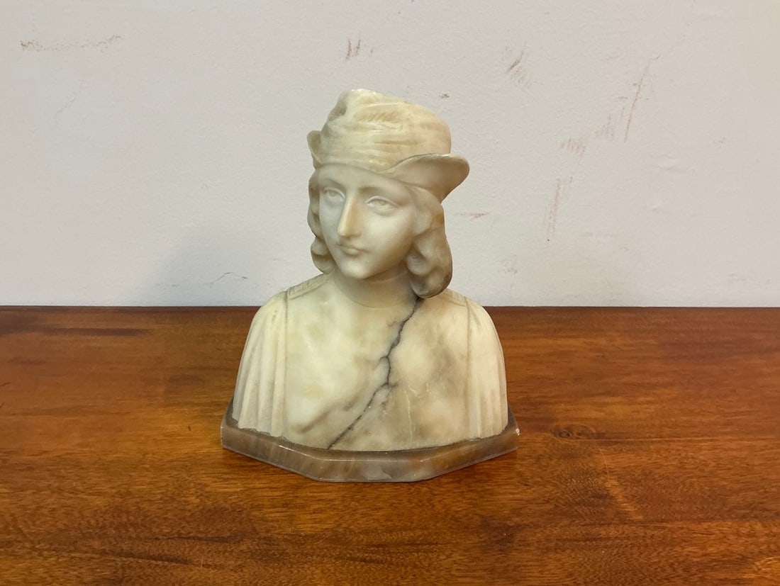 Antique Italian Carved Alabaster Bust with Marble Base: This exquisite antique Italian carved alabaster bust stands 6 1/4 inches high and 7 inches wide, showcasing intricate details and craftsmanship characteristic of the region. The bust features a