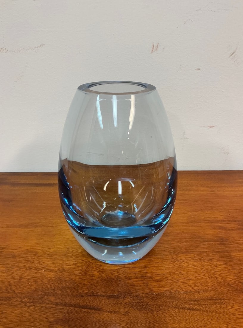 Holmegaard Hellas Per Lutken Danish Aqua Blue Glass Vase: This exquisite Holmegaard Hellas Per Lutken Danish aqua blue glass vase showcases the elegant design and craftsmanship for which Holmegaard is renowned. The vase features a captivating aqua blue hue t