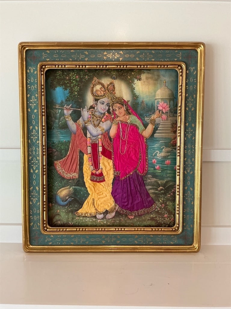 Framed Exotic India Riddhi Siddhi Lord Ganesha Tanjore w/ inlaid work on wood: This exquisite artwork features the serene depiction of Lord Ganesha, crafted through traditional Tanjore painting techniques. The piece showcases vibrant colors and intricate inlaid work on wood, enh