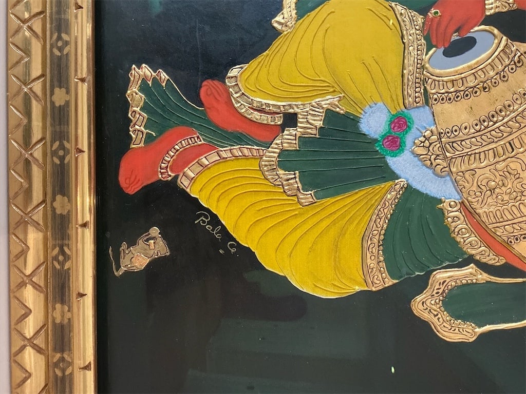 Framed Lord Ganesha painting of the Hindu dietary Lord Ganesha: This exquisite framed painting features Lord Ganesha, the revered deity of wisdom and prosperity in Hindu mythology. The artwork captures the deity in vibrant colors, showcasing intricate details that