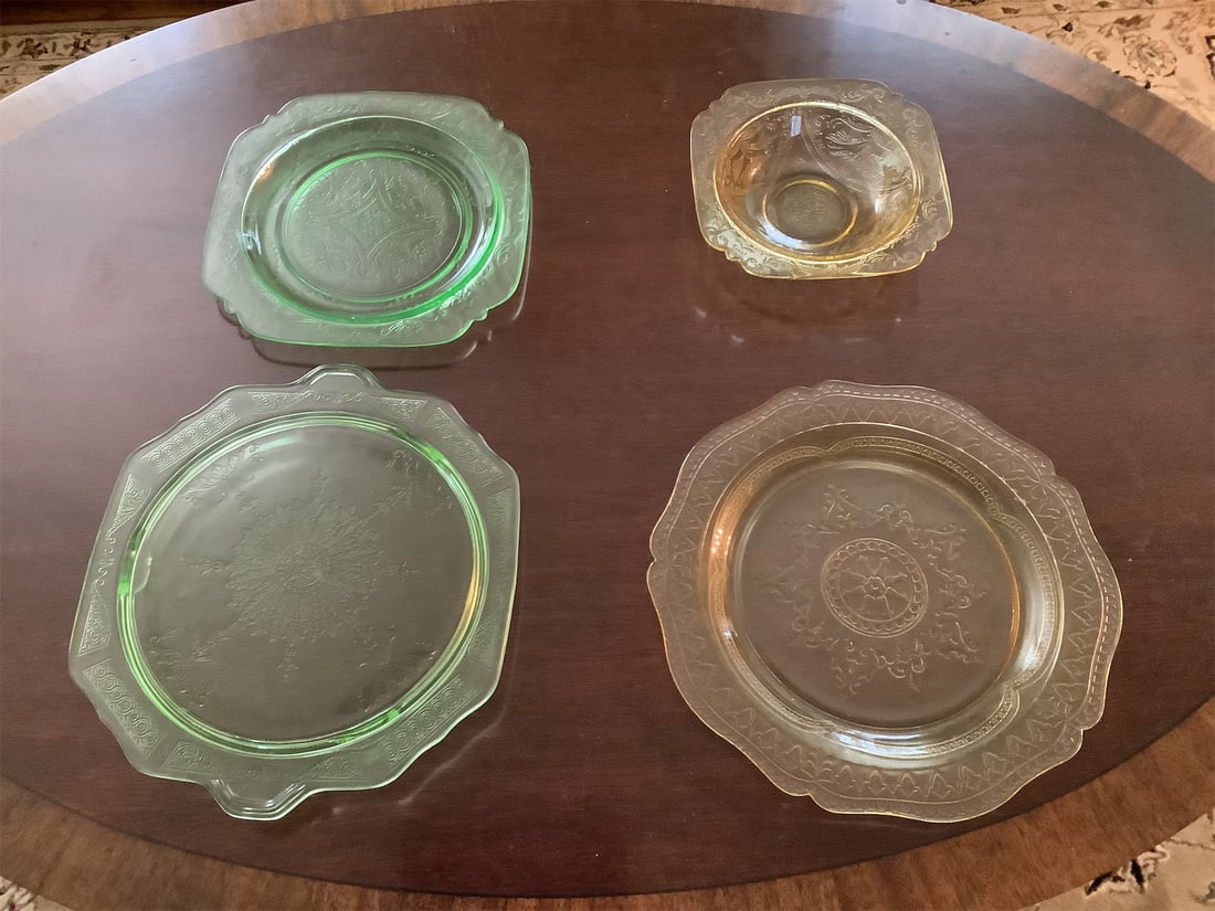 2sets of Depression glass dishes: This listing features two sets of beautiful Depression glass dishes, showcasing exquisite craftsmanship and vintage charm. The first set includes vibrant green pieces, characterized by intricate