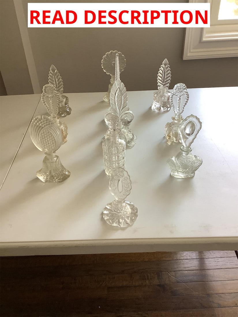 Perfume bottles: A stunning collection of vintage perfume bottles, featuring unique designs that showcase the artistry of glass craftsmanship. This assortment includes various shapes and styles, each with intricate