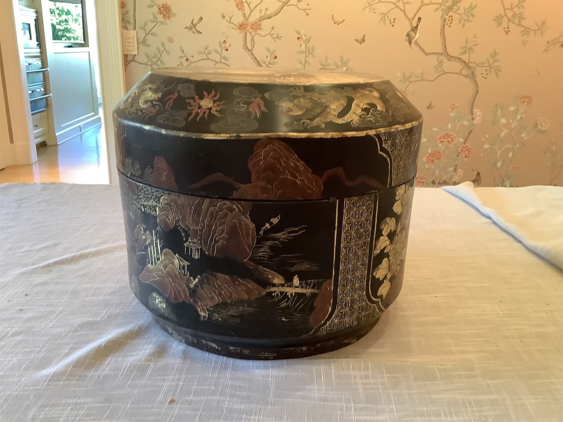 Large Vintage Chinese Black Lacquer Round Box: This large vintage Chinese Black Lacquer box showcases exquisite craftsmanship with a striking design. The exterior features intricate hand-painted scenes, including lush landscapes, floral motifs,