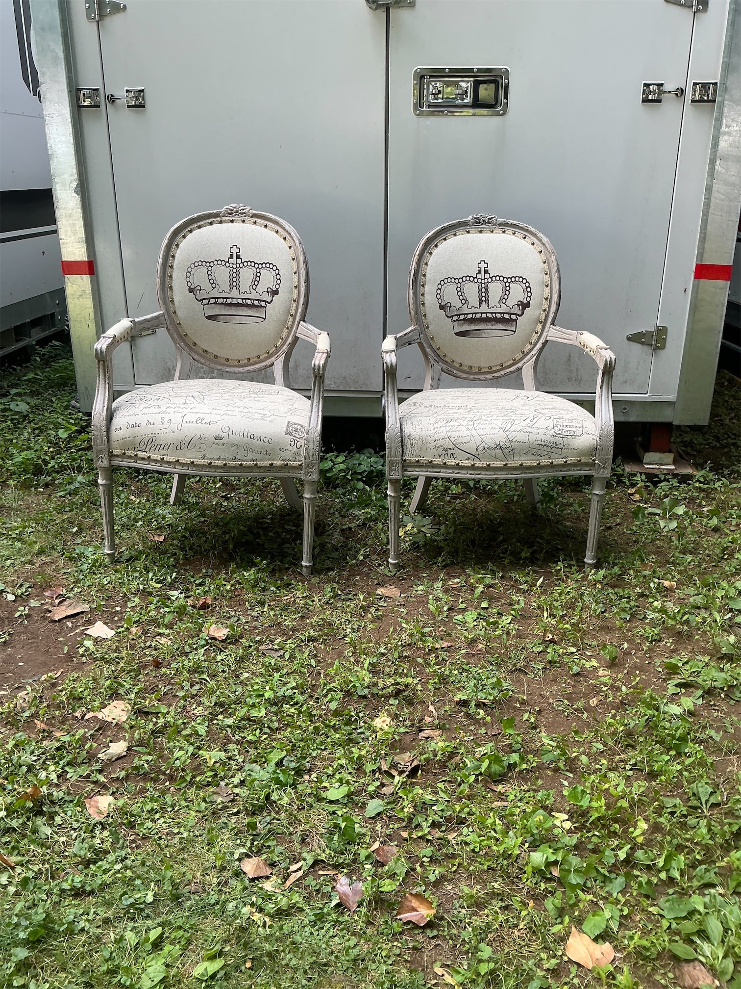 Bubble Chairs: This listing features a pair of elegantly designed Bubble Chairs, showcasing a unique blend of vintage charm and contemporary flair. Each chair is adorned with a striking crown motif, adding a regal