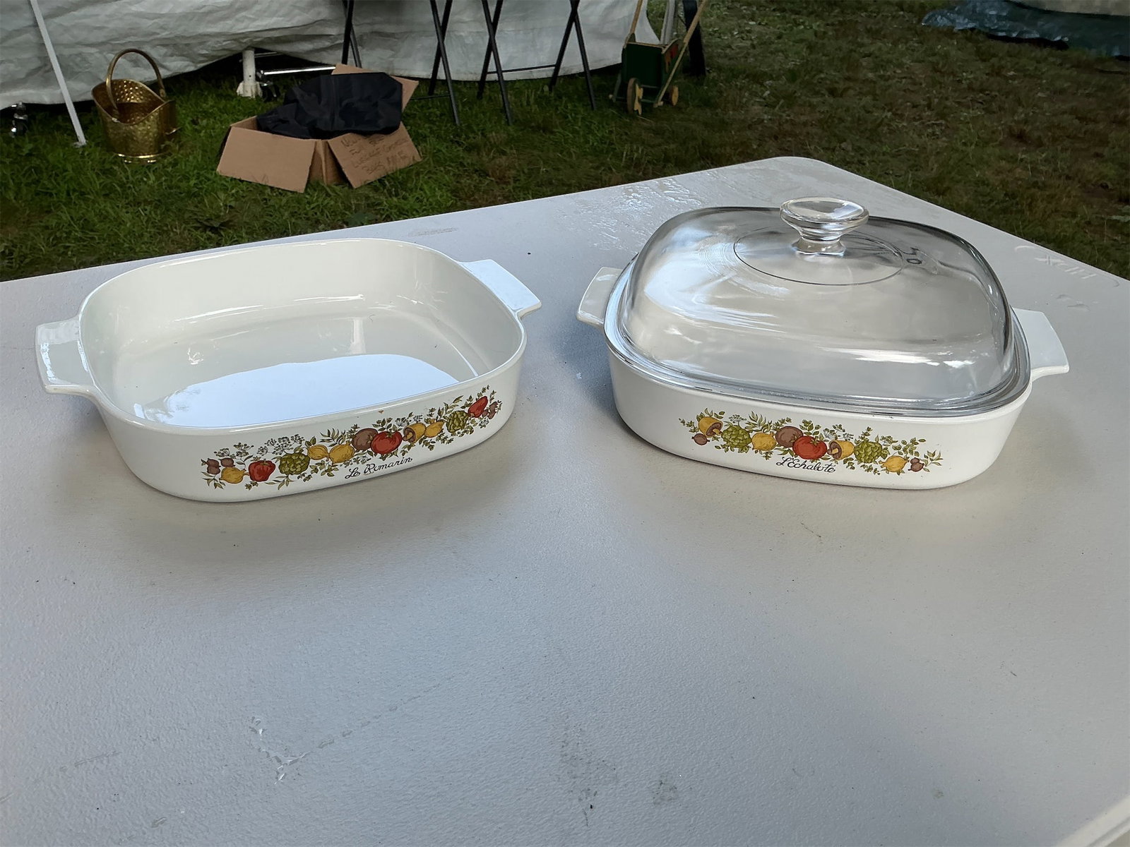 Vintage Corning Ware "Spice of Life" Baking Dish Set of 2: This Vintage Corning Ware "Spice of Life" Baking Dish Set includes two beautifully designed dishes that capture the essence of classic kitchenware. Each dish features charming vegetable motifs, showca