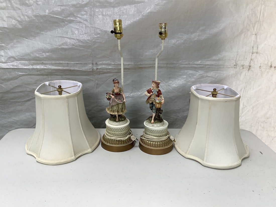 Vintage Porcelain Figurine Lamps: This listing features a charming pair of vintage porcelain figurine lamps, showcasing intricate detailing and craftsmanship. Each lamp is topped with a delicate figurine: one depicts a young woman