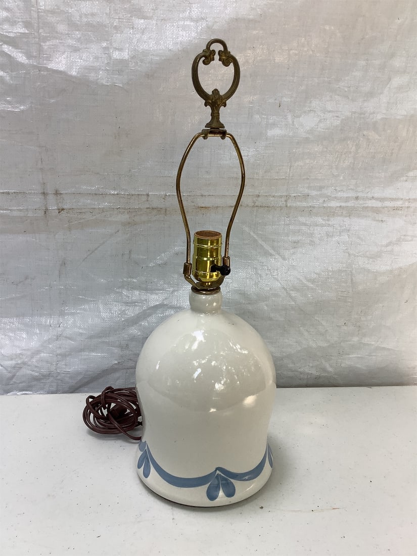Ceramic White and Blue Leaf Pattern Lamp: This elegant ceramic lamp features a stunning white body adorned with a delicate blue leaf pattern, exuding a timeless charm suitable for various decor styles. The design is complemented by an ornate 
