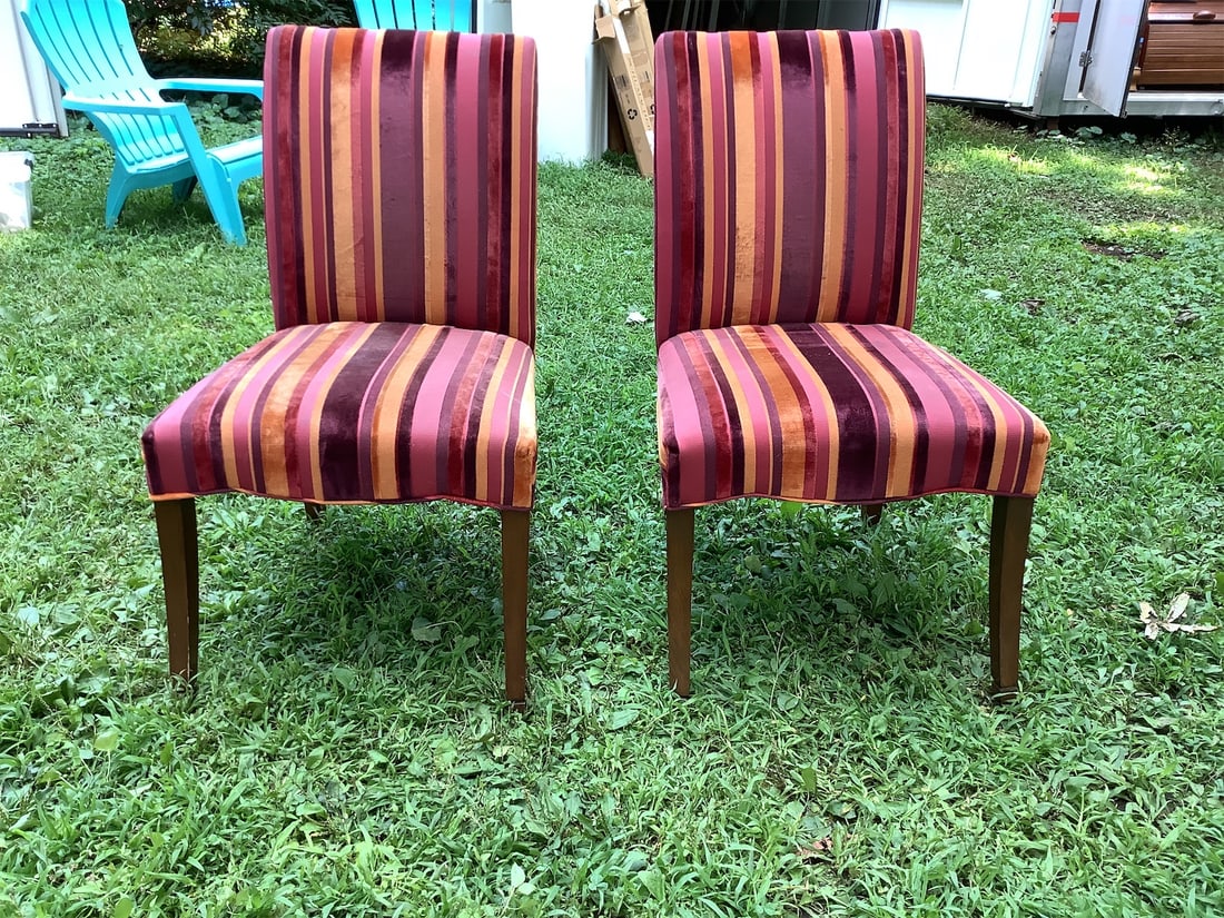 Retro Dining Chairs: This listing features a pair of striking striped dining chairs that are sure to enhance any dining space. Each chair showcases a vibrant mix of colors, including rich reds, warm oranges, and golden