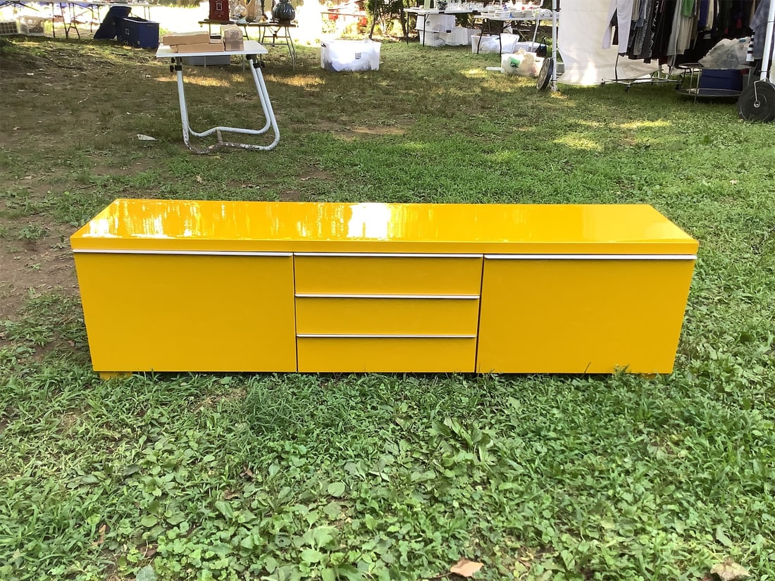 Yellow IKEA Besta Burs Sideboard: This vibrant yellow cabinet offers a modern and stylish addition to any space. Featuring a sleek, glossy finish, it provides ample storage with multiple drawers and compartments. The clean lines and