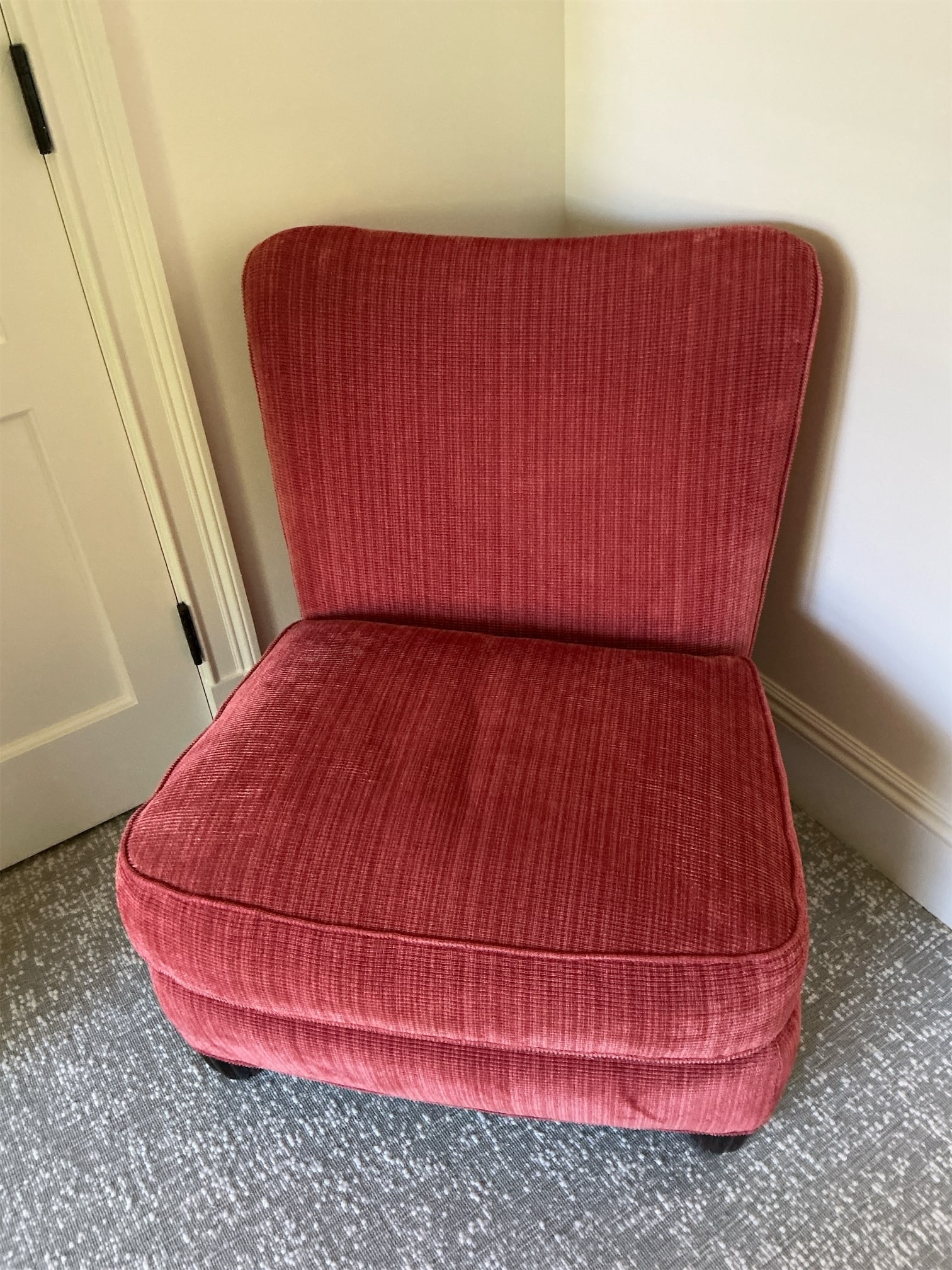 Cooper orange side chair: Introducing the Cooper orange side chair, a stylish and comfortable addition to any space. Featuring a vibrant orange fabric with a subtle stripe pattern, this chair offers both aesthetic appeal and