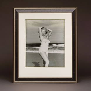 Marilyn 'Pulling a Pose' by André De Dienes: Artist: André De Dienes (1913-1985)Title: Marilyn 'Pulling a Pose' by André De DienesDate: 1949Medium: Vintage gelatin-silver photograph on double-weight paper.Limited Edition: NoGenre: Portrait