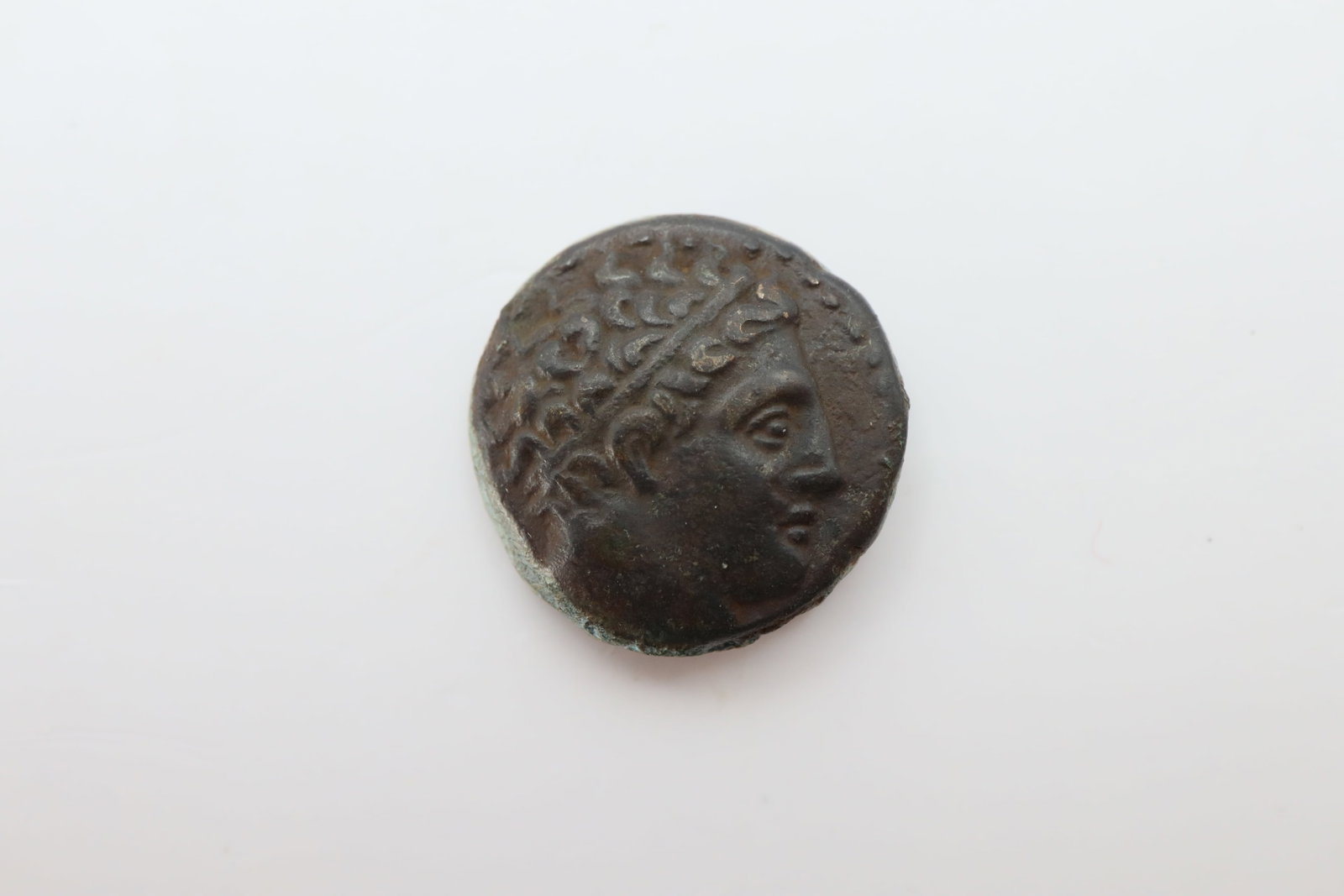 Kingdom of Macedon, Philip II AE 18mm: Kingdom of Macedon, Philip II AE 18mm. Uncertain mint in Macedon, circa 359-336 BC. Diademed male head to right / Youth on horseback to right; ?I?I??OY above, monogram and trident below. SNG Alpha Ban