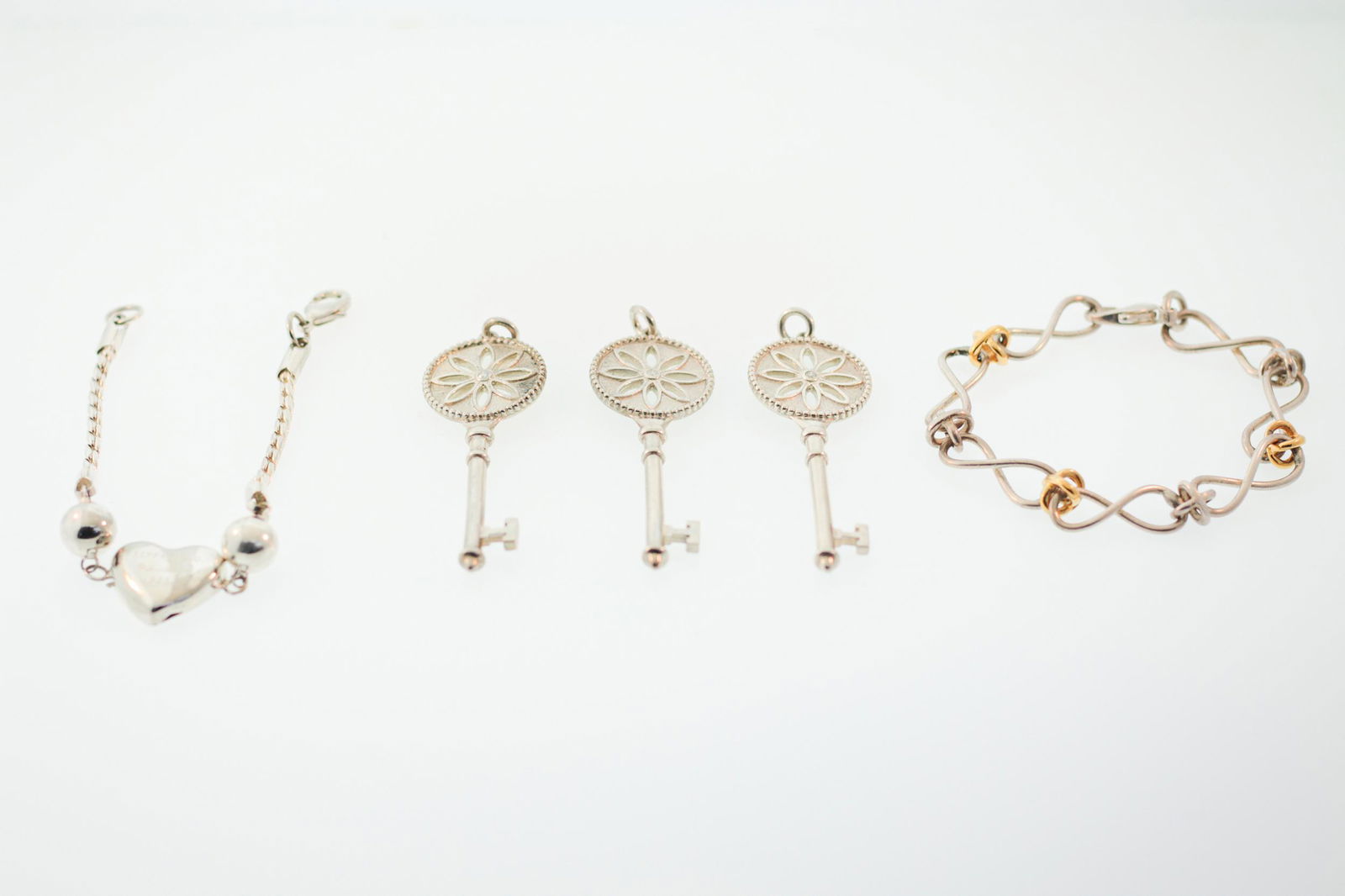 AN ASSORTMENT OF STERLING SILVER JEWELRY, INCLUDING TWO BRACELETS (1 of 1)