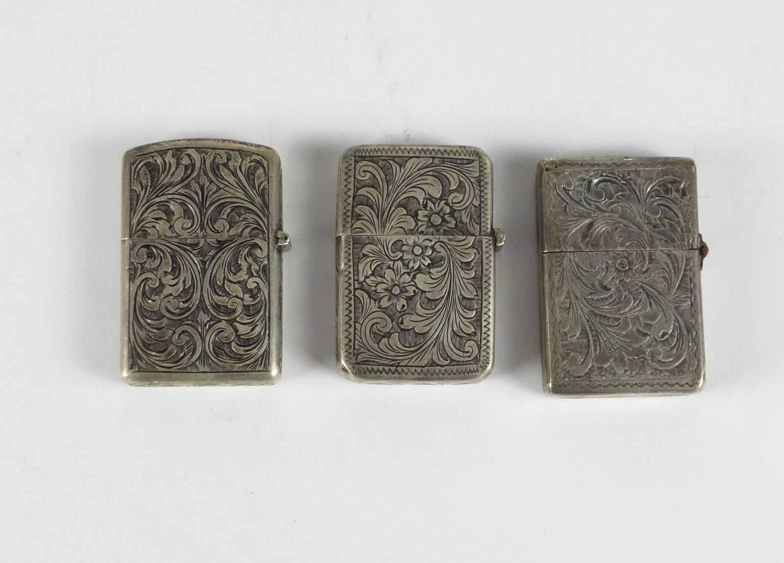 Three Vintage Silver Lighters. (1 of 1)