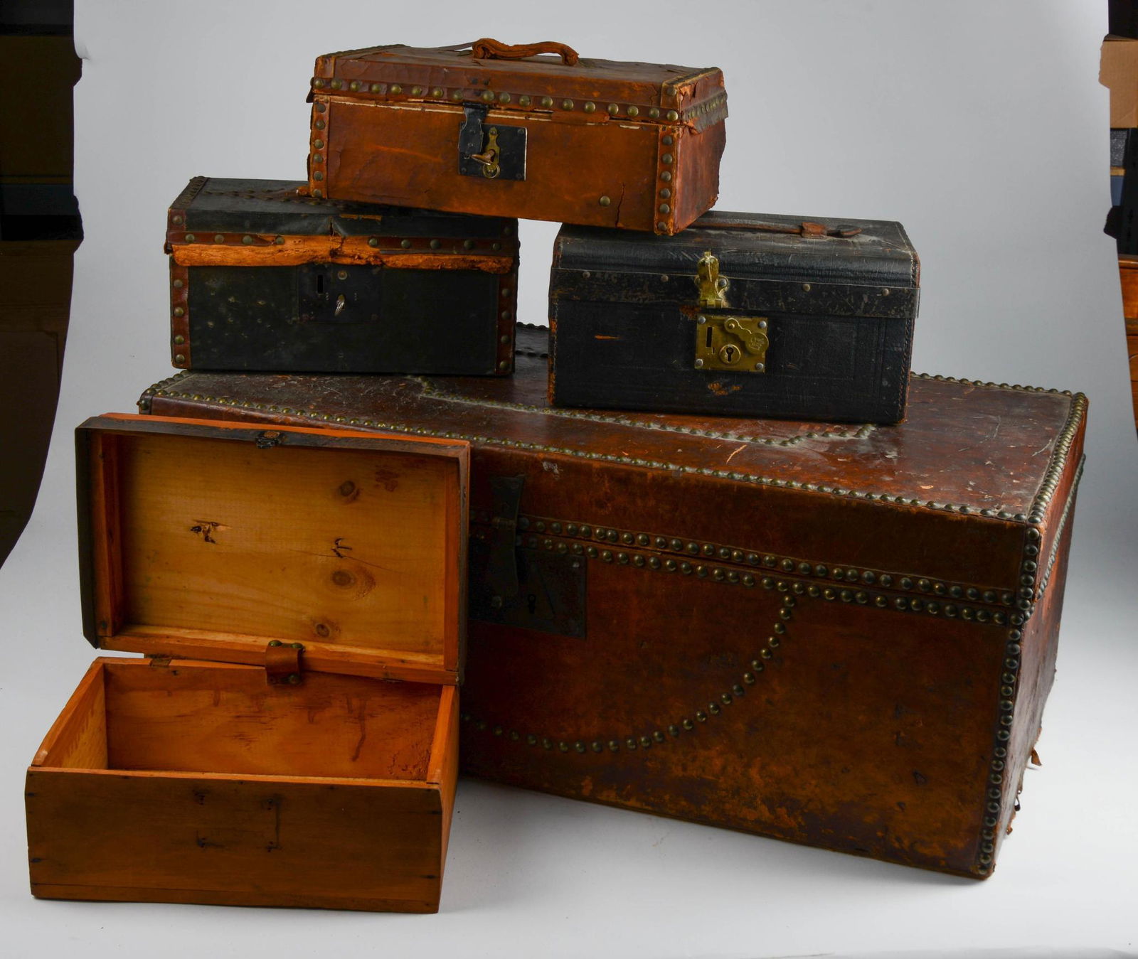Four Leather Bound Trunks. (1 of 8)