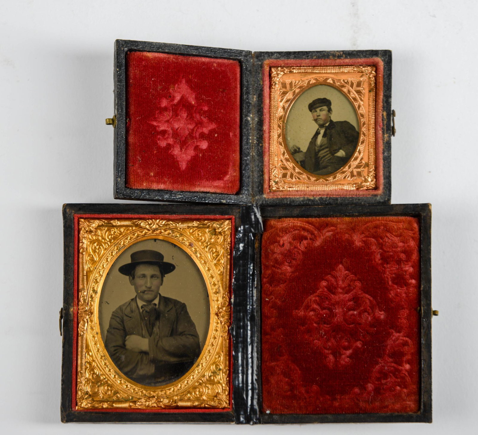Two Tintypes of Men Smoking Cigarettes.: 1.75 x 1.25 and 2.5 x 2 inches. Condition reports are not available for the items in this catalog. These are antique and vintage items, and will show signs of use and wear. We have attempted to show a