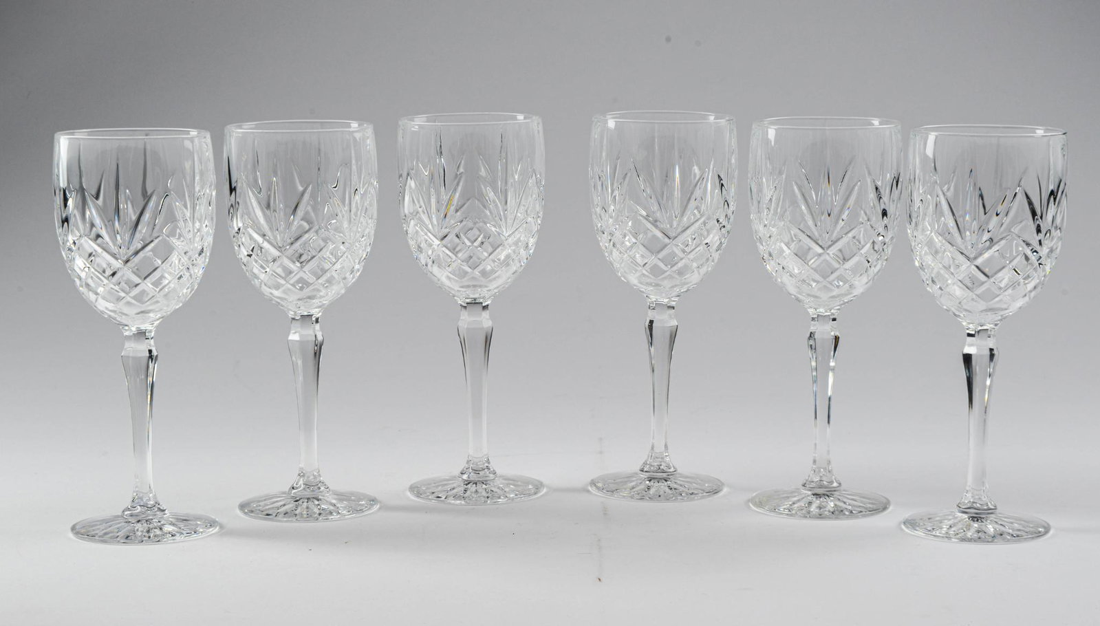 Six Cut Glass Stemmed Wine Glasses: 7 inches