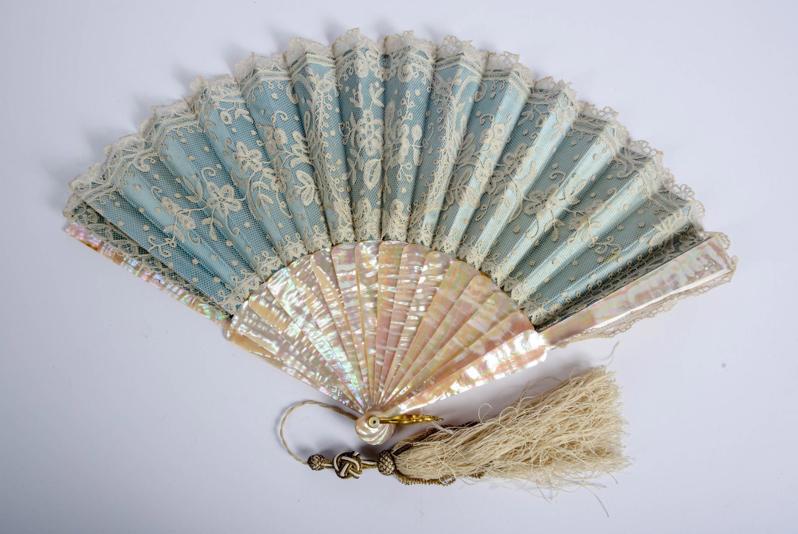 Lace Fan With Mother of Pearl Stays.: Length 9.5 inches.
