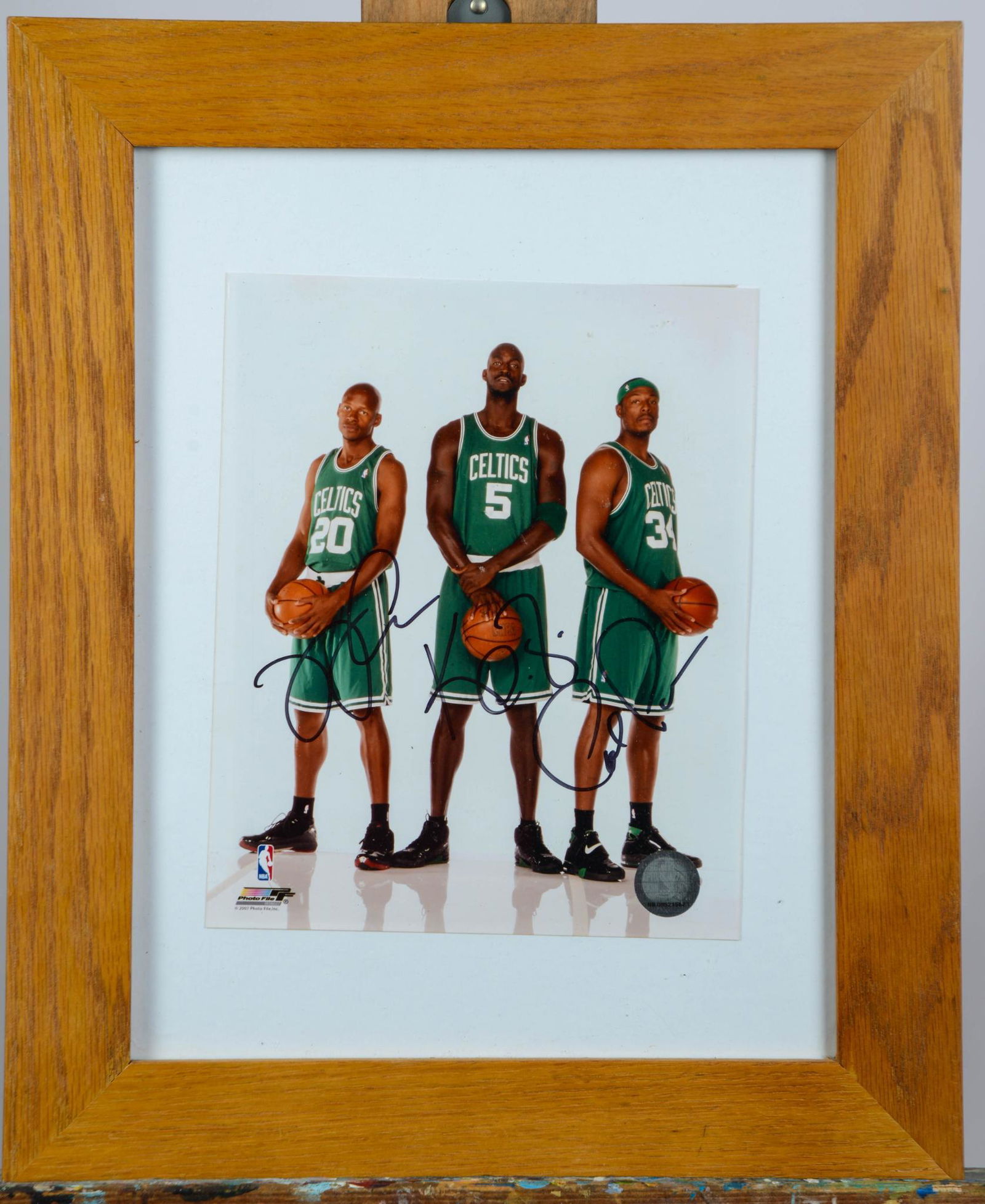 Paul Pierce, Kevin Garnett & Ray Allen Signed Celtics Photograph. (1 of 2)