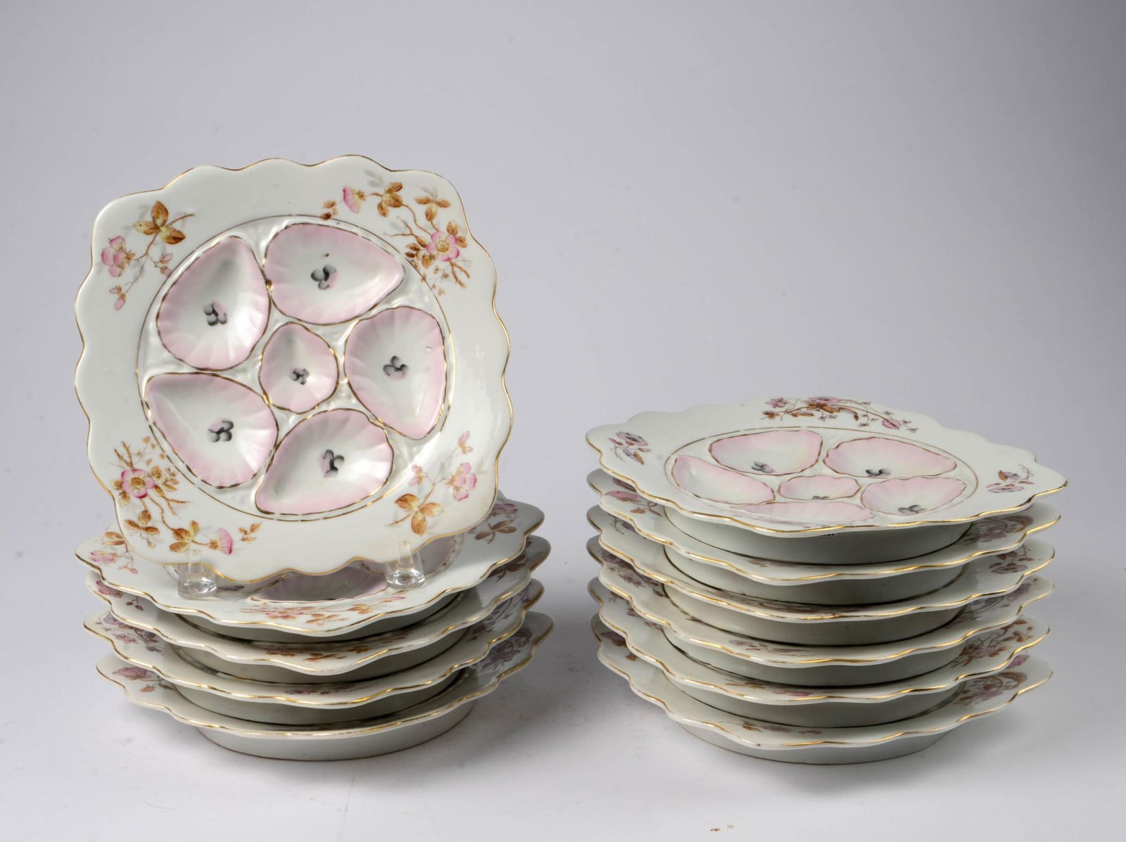Eleven Hand Painted Oyster Plates. (1 of 4)