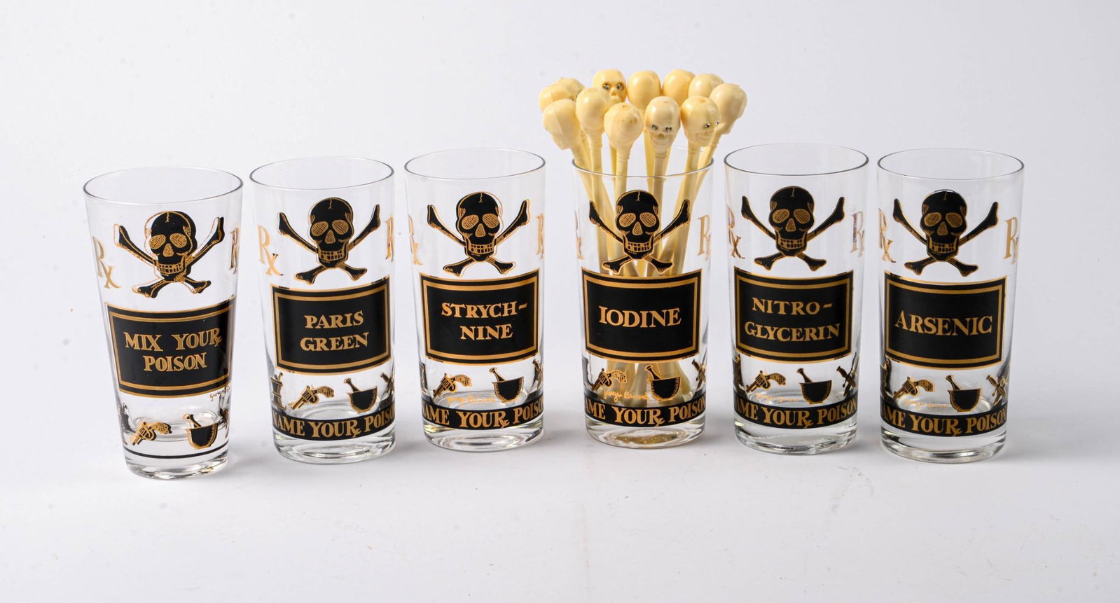 Six Pick Your Poinson Tumblers.: Height 5.5 inches, together with 12 skull stirrers.