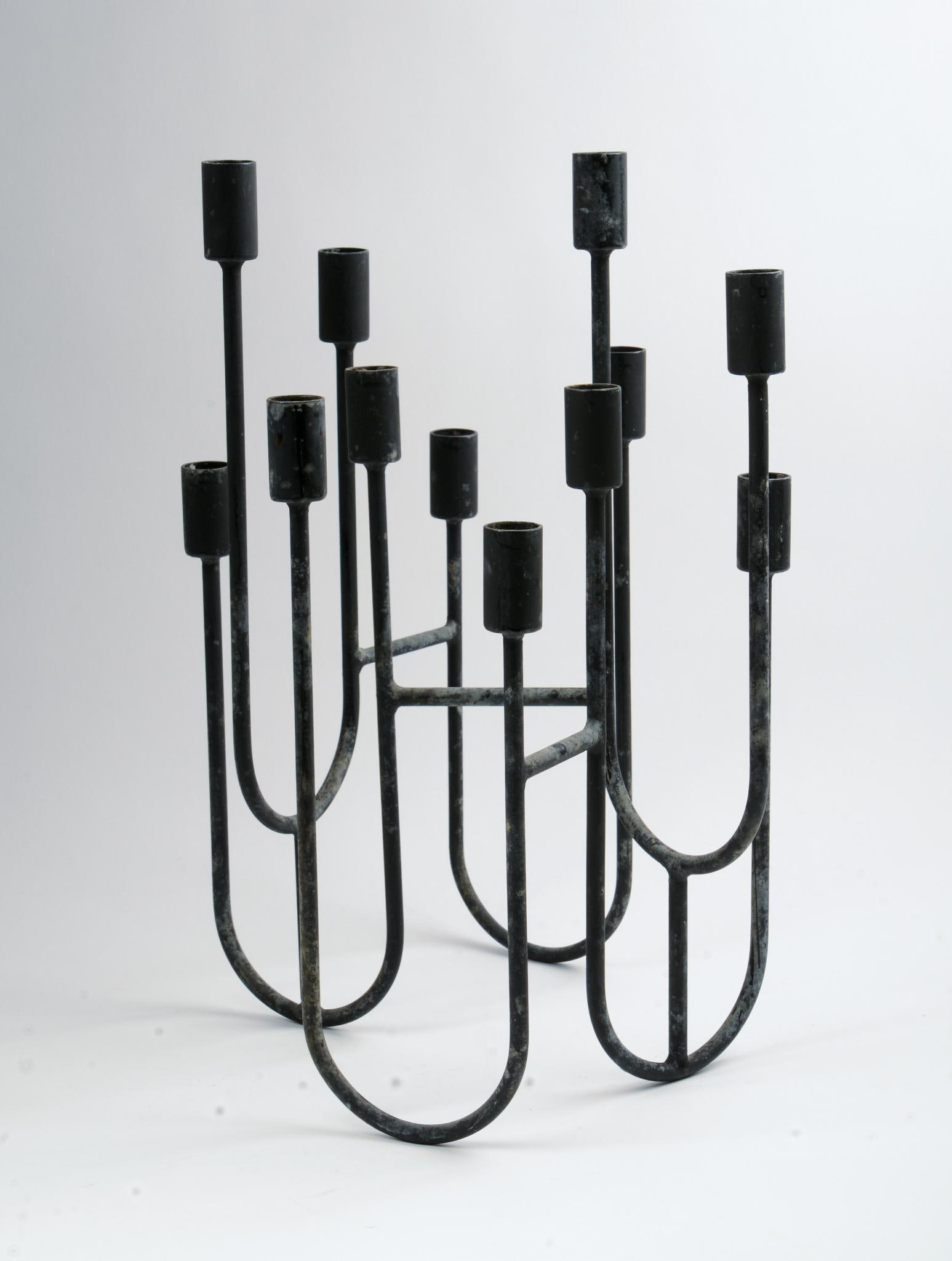 MCM WROUGHT IRON SCULPTURAL CANDLE HOLDER: Twelve light, height 17 inches.