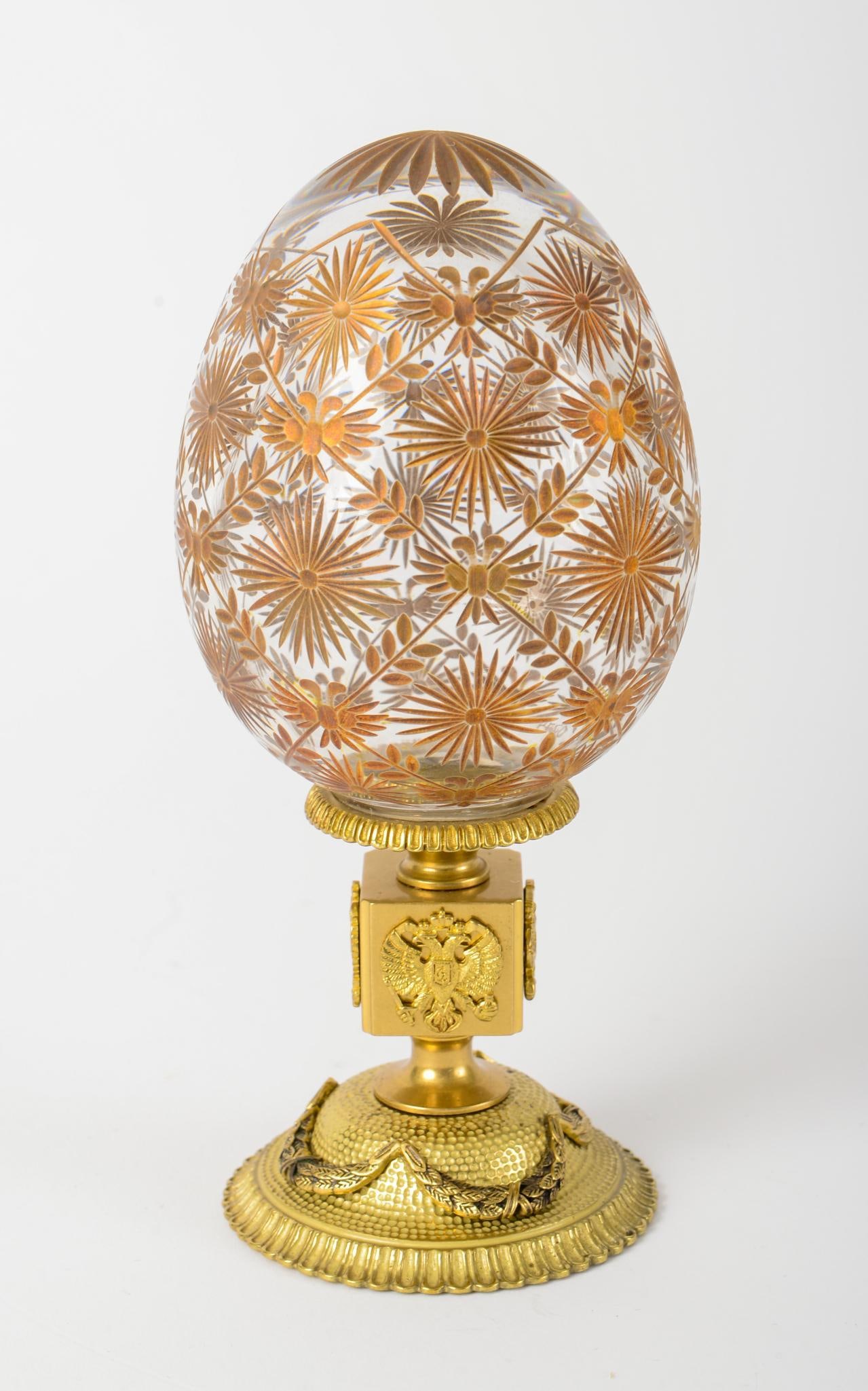 FABERGE GLASS EGG ON GILT STAND. (1 of 3)