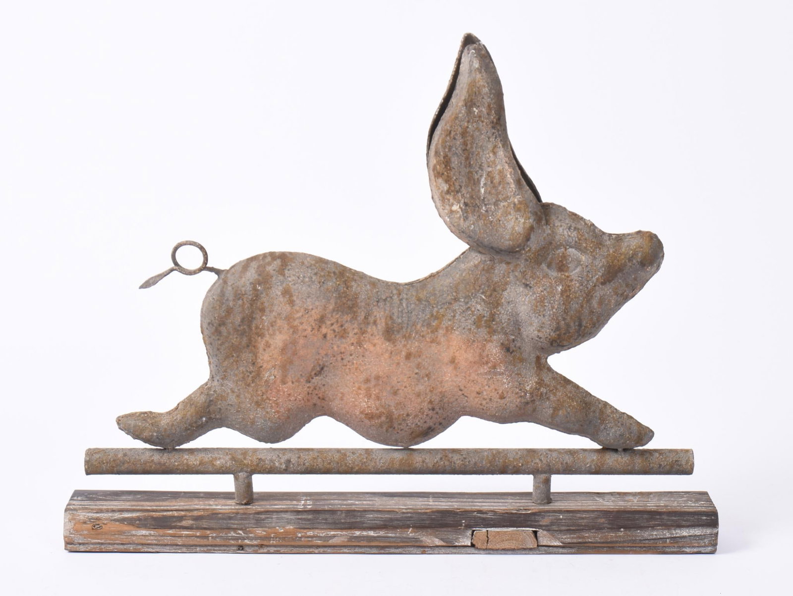 WEATHERED METAL PIG ON WOOD BASE: Height 22 inches, length 27.5 inches