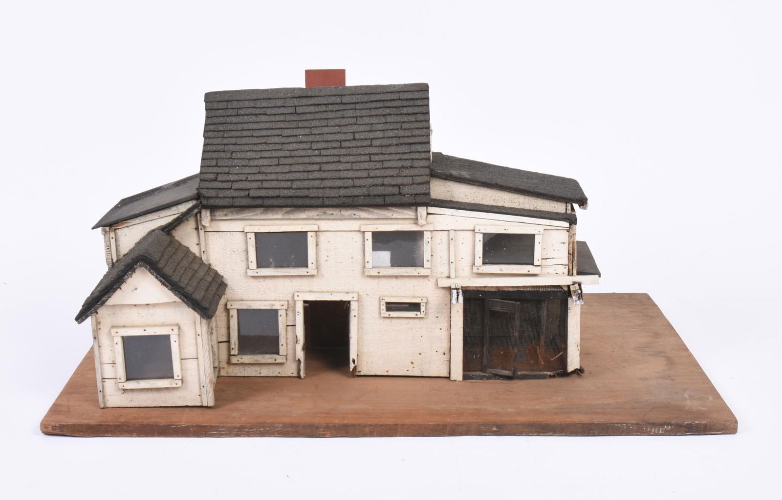 FOLK ART MODEL OF A BUILDING: Length 29 inches.