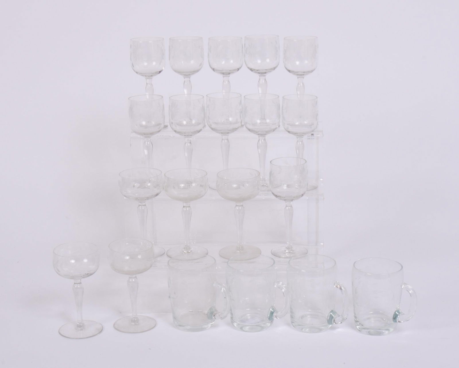 ELEVEN CRYSTAL CORDIALS WITH FLORAL ETCHING: With 5 other matching cordials and 4 crystal etched mugs, taller cordials height 5.5 inches