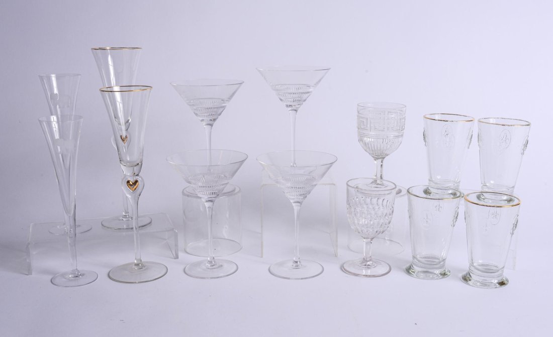 GROUP OF CRYSTAL GLASSWARE: Including 4 Ralph Lauren Martini glasses, 4 Clairey France glasses with fleur de lis, 2 pairs of champagne glasses and 2 other wine glasses, martini glass height 7.25 inches, good condition