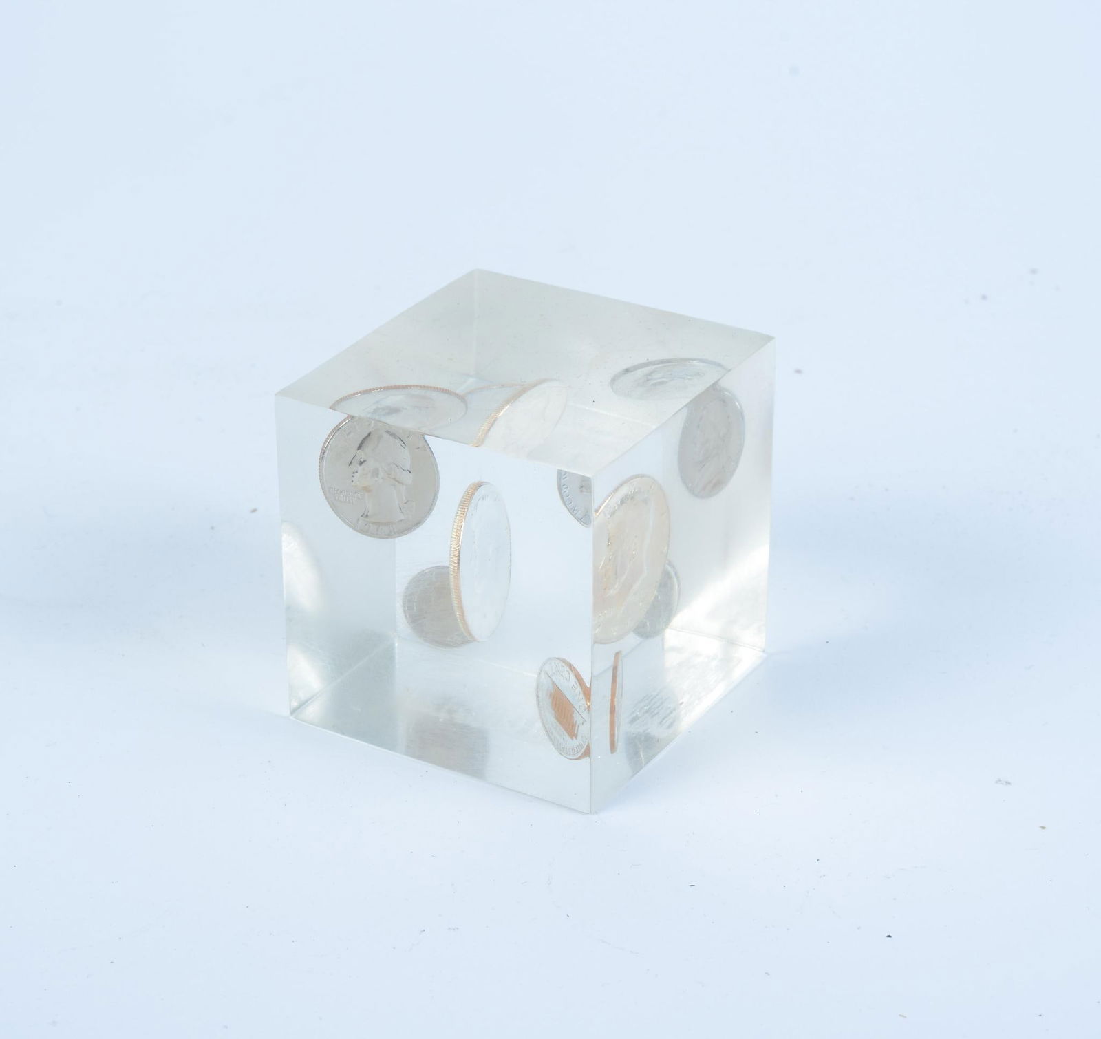 COINS FROM 1968 IN LUCITE CUBE