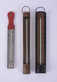THREE BRASS AND METAL THERMOMETERS