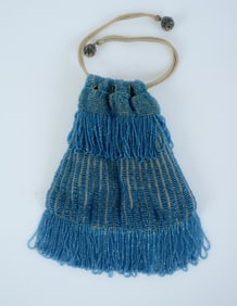 TURQUOISE BEADED PURSE.