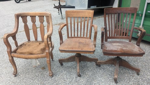 THREE OAK ARM CHAIRS