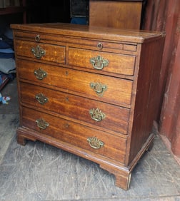 DIMINUITIVE GEORGIAN BACHELOR'S CHEST.